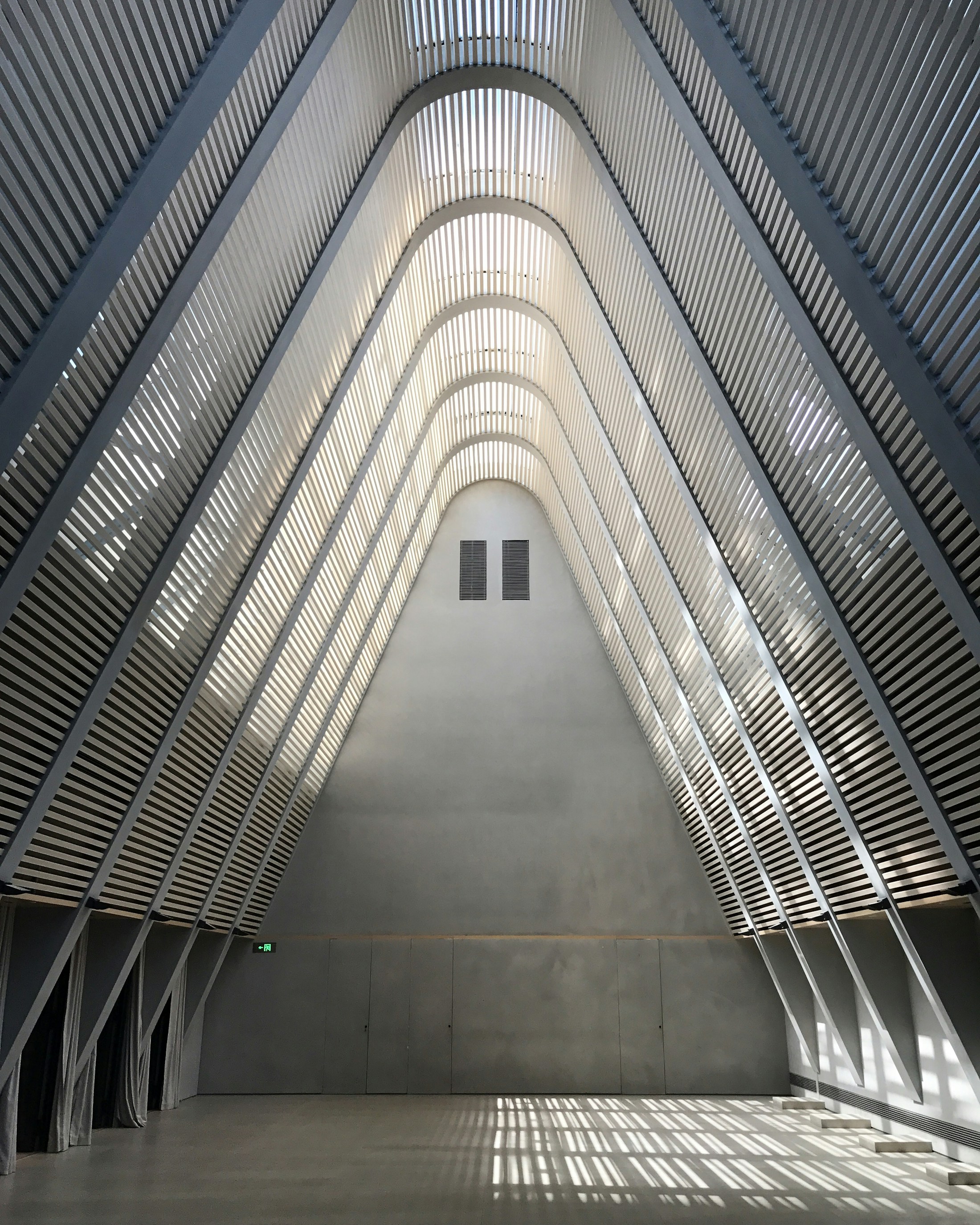 Real photograph of a spacious contemporary hotel and clubhouse interior